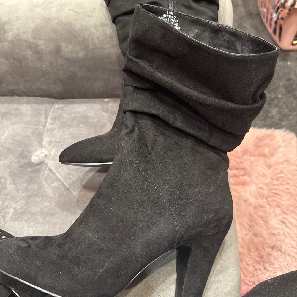 Black slouched nine W. boot
